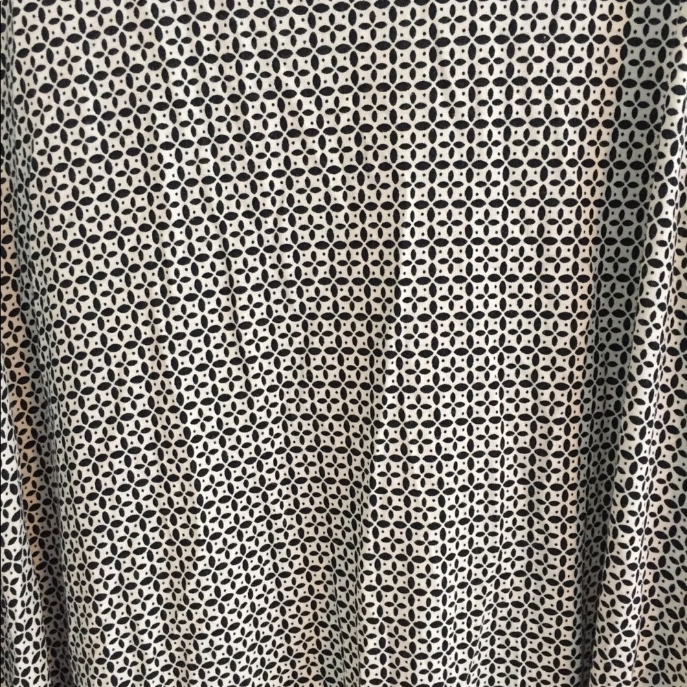 Black and white patterned dress.
